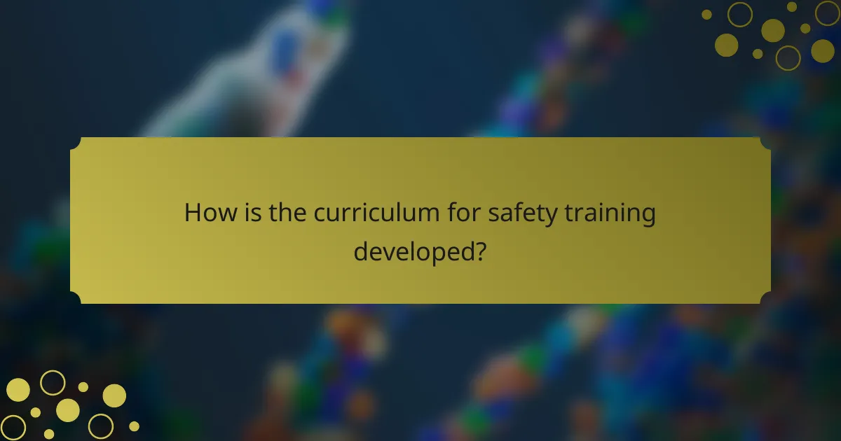 How is the curriculum for safety training developed?