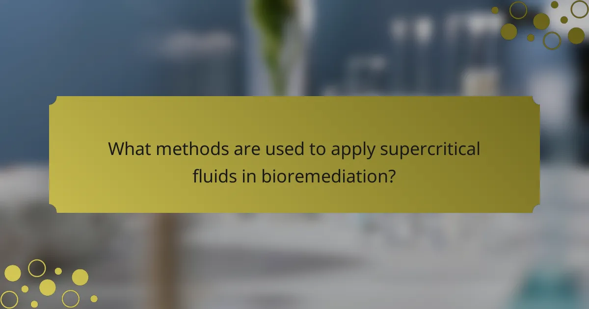 What methods are used to apply supercritical fluids in bioremediation?